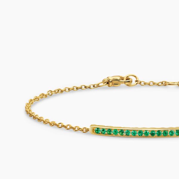 on-model styling shot|David Yurman Petite Pavé Bar Bracelet in 18K Yellow Gold with Emeralds