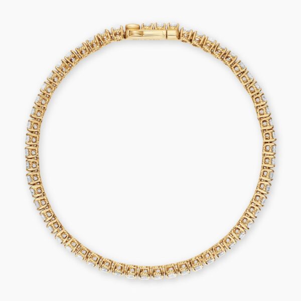 3mm Gold – worn on the wrist