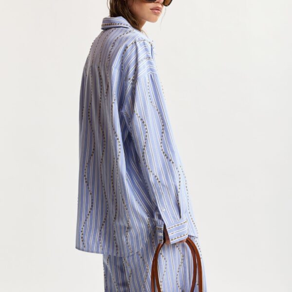 Essentiel Antwerp Light Blue And White Striped Oversized Shirt With Stud Embellishments - Essentiel Antwerp Tops - Colorful Belgian Design - Shop at Coveti