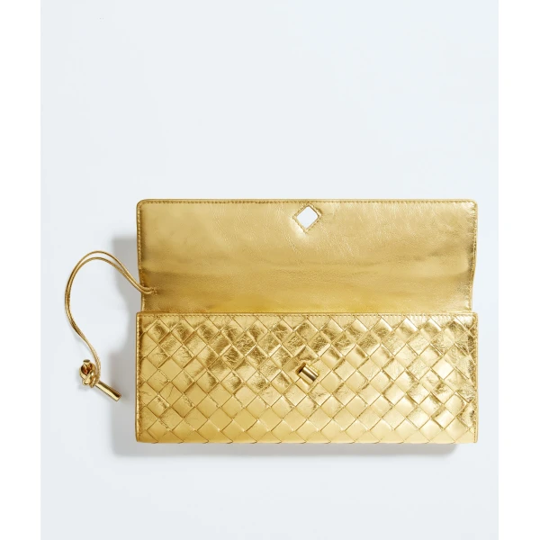 Khaite Women's Andiamo Clutch in Gold - Gold Clutch Bags - The Lotus Tote Bag - Shop at Coveti