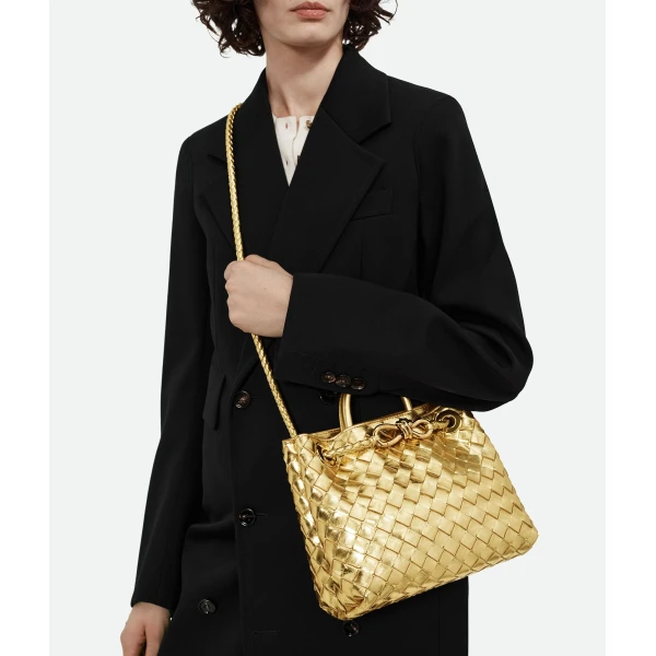 Khaite Women's Small Andiamo in Gold - Gold Totes & Top-Handle Bags - The Lotus Tote Bag - Shop at Coveti