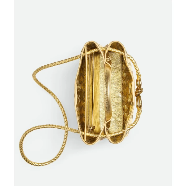 Khaite Women's Small Andiamo in Gold - Gold Totes & Top-Handle Bags - The Lotus Tote Bag - Shop at Coveti