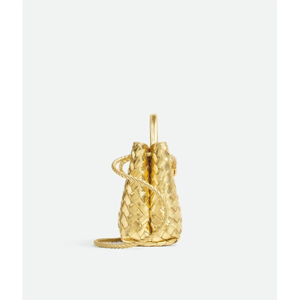 Khaite Women's Small Andiamo in Gold - Gold Totes & Top-Handle Bags - The Lotus Tote Bag - Shop at Coveti