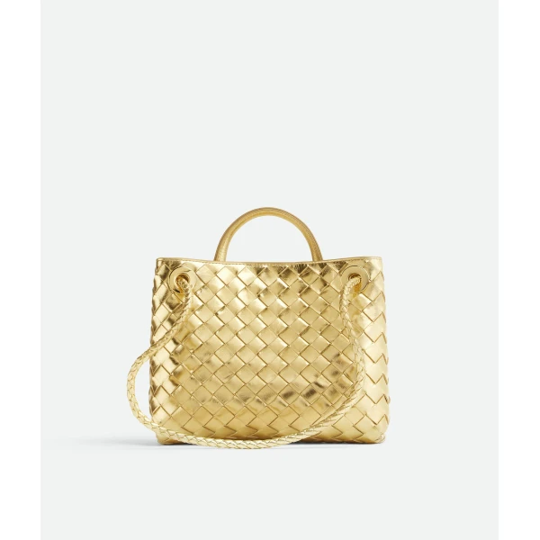 Khaite Women's Small Andiamo in Gold - Gold Totes & Top-Handle Bags - The Lotus Tote Bag - Shop at Coveti