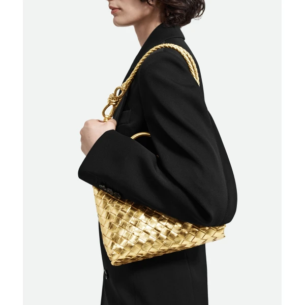 Khaite Women's Small Andiamo in Gold - Gold Totes & Top-Handle Bags - The Lotus Tote Bag - Shop at Coveti