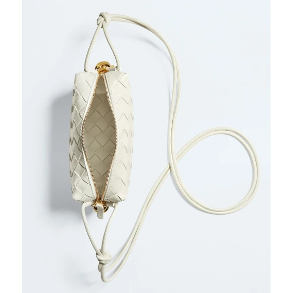 Khaite Women's Mini Loop Metal Knots in Bone - Ivory Mini Bags - The Lotus Tote Bag - Shop at Coveti