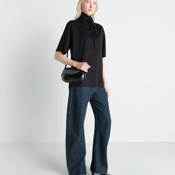 Lemaire High Waisted Curved Pants in Denim - Pants - Parisian Minimalist Luxury at Coveti