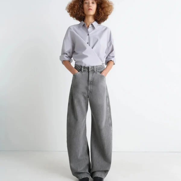 Lemaire High Waisted Curved Pants in Denim - Pants - Parisian Minimalist Luxury at Coveti