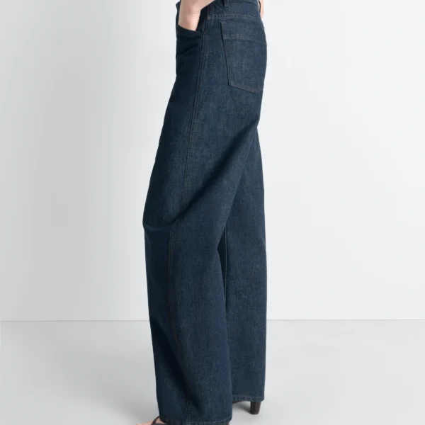 Lemaire High Waisted Curved Pants in Denim - Pants - Parisian Minimalist Luxury at Coveti