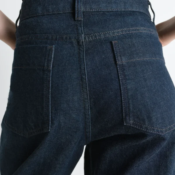 Lemaire High Waisted Curved Pants in Denim - Pants - Parisian Minimalist Luxury at Coveti