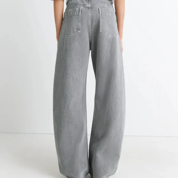 Lemaire High Waisted Curved Pants in Denim - Pants - Parisian Minimalist Luxury at Coveti