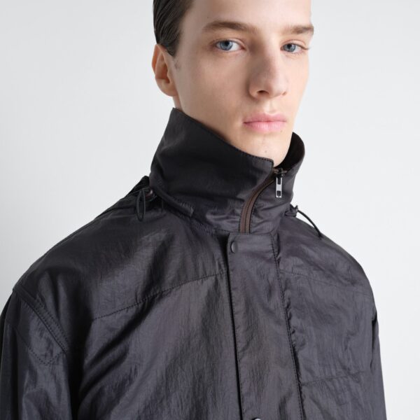 Lemaire Hooded Raincoat in Light Nylon - Coats - Parisian Minimalist Luxury at Coveti