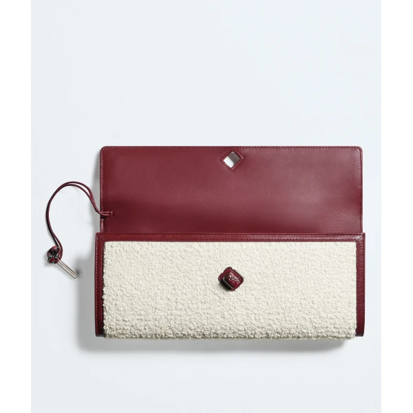 Khaite Women's Andiamo Clutch in White/lava red - Multicolour Clutch Bags - The Lotus Tote Bag - Shop at Coveti