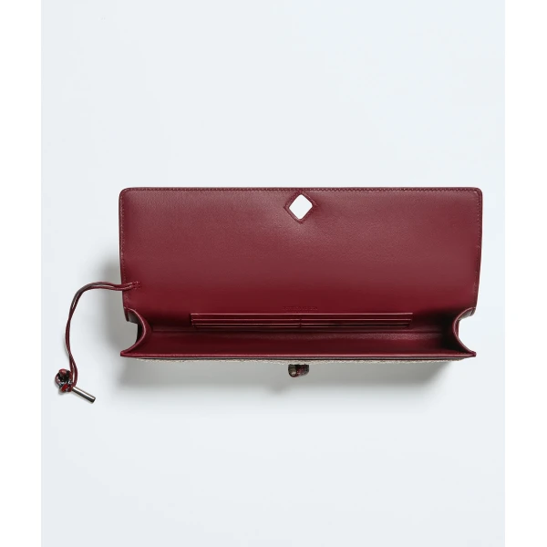 Khaite Women's Andiamo Clutch in White/lava red - Multicolour Clutch Bags - The Lotus Tote Bag - Shop at Coveti