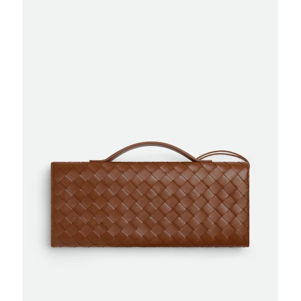Khaite Women's Andiamo Clutch in Amber - Orange Clutch Bags - The Lotus Tote Bag - Shop at Coveti