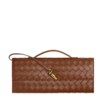 Khaite Women's Andiamo Clutch in Amber - Orange Clutch Bags - The Lotus Tote Bag - Shop at Coveti