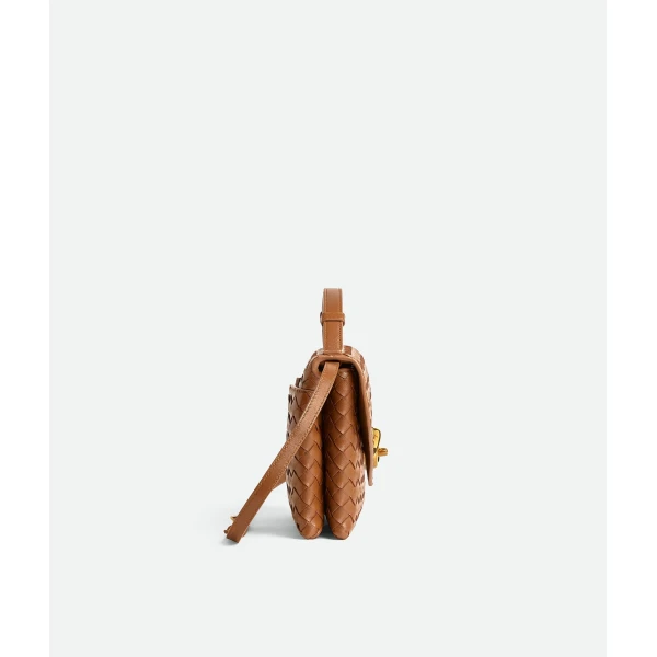 Khaite Women's Knot Lock in Amber - Orange Clutch Bags - The Lotus Tote Bag - Shop at Coveti