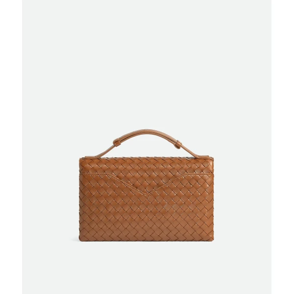 Khaite Women's Knot Lock in Amber - Orange Clutch Bags - The Lotus Tote Bag - Shop at Coveti