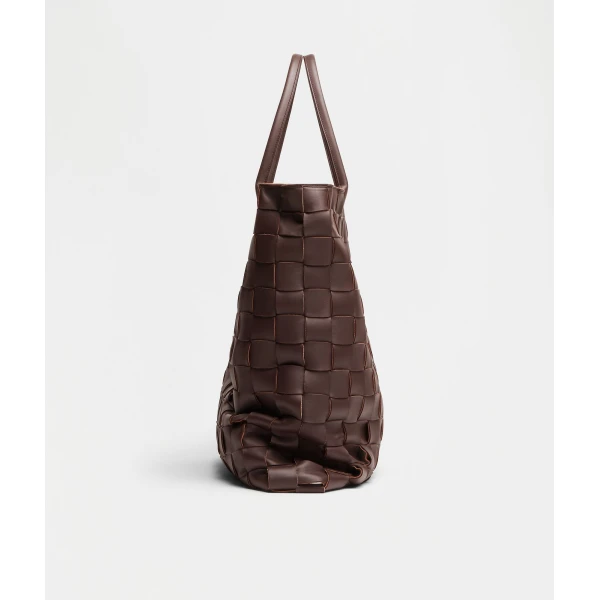 Khaite Maxi Intreccio Tote in Oxblood - Red Totes & Top-Handle Bags - The Lotus Tote Bag - Shop at Coveti