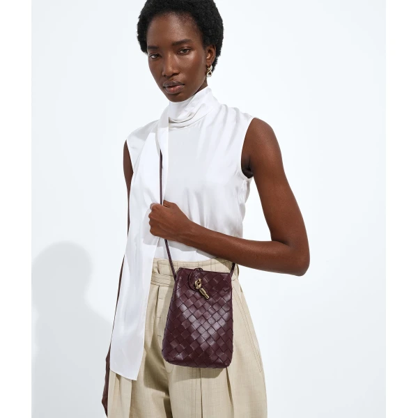 Khaite Women's Andiamo Phone Pouch in Deep mahogany - Red Mini Bags - The Lotus Tote Bag - Shop at Coveti
