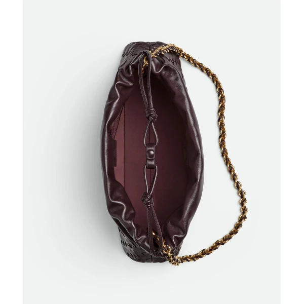 Khaite Women's Dustbag Notte in Dark barolo - Red Shoulder & Crossbody Bags - The Lotus Tote Bag - Shop at Coveti