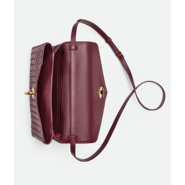 Khaite Women's Knot Lock in Barolo - Red Clutch Bags - The Lotus Tote Bag - Shop at Coveti