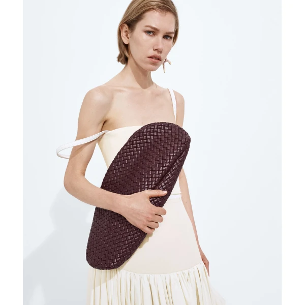 Khaite Women's Onda Clutch in Deep mahogany - Red Clutch Bags - The Lotus Tote Bag - Shop at Coveti