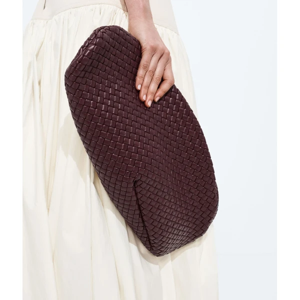 Khaite Women's Onda Clutch in Deep mahogany - Red Clutch Bags - The Lotus Tote Bag - Shop at Coveti