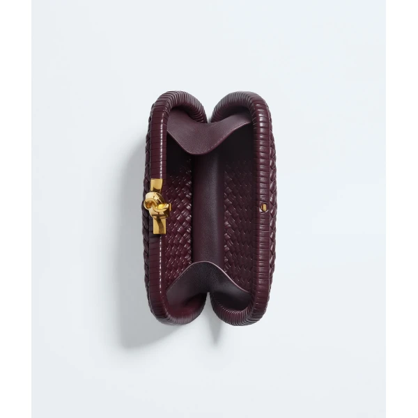 Khaite Women's Soft Knot in Deep mahogany - Red Clutch Bags - The Lotus Tote Bag - Shop at Coveti