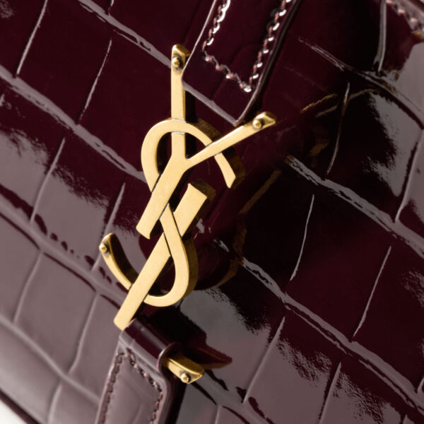 Saint Laurent LE 5 À 7 in crocodile-embossed patent leather designed in Paris