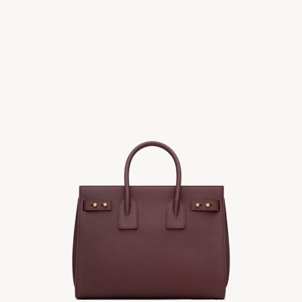 Saint Laurent SAC DE JOUR IN SUPPLE GRAINED LEATHER - SMALL designed in Paris