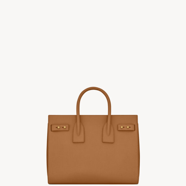 Saint Laurent SAC DE JOUR IN SUPPLE GRAINED LEATHER - SMALL designed in Paris