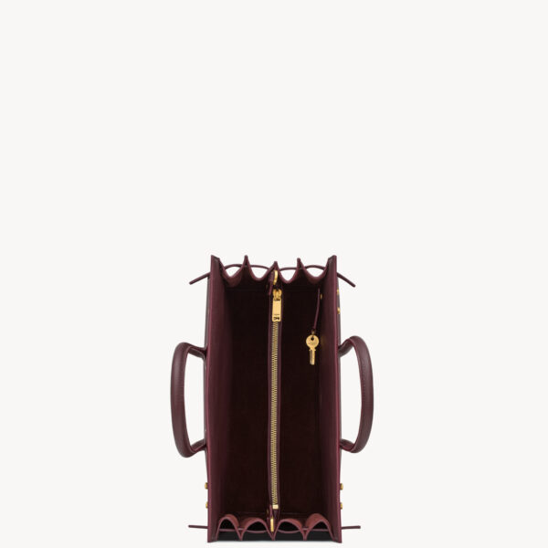 Saint Laurent SAC DE JOUR IN SUPPLE GRAINED LEATHER - SMALL designed in Paris
