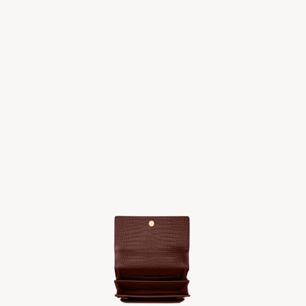Saint Laurent SUNSET MEDIUM IN CROCODILE-EMBOSSED LEATHER designed in Paris