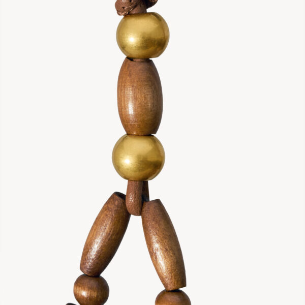 Saint Laurent supple bucket in wood beads designed in Paris