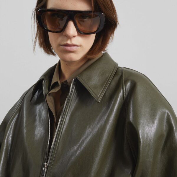 The Frankie Shop Annette Faux Leather Peplum Jacket - Olive - Oversized Minimalist Jackets in Green - Shop at Coveti