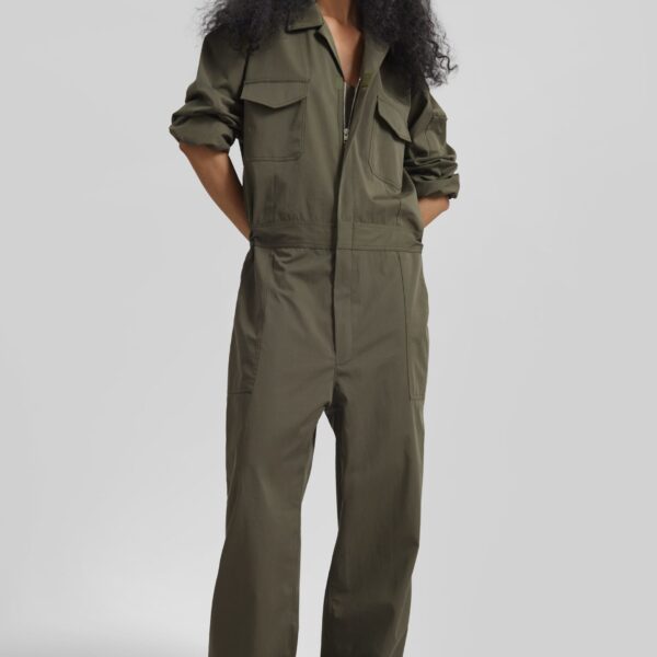 The Frankie Shop Ardea Cotton Utility Jumpsuit - Dark Olive - Oversized Minimalist Jumpsuit in Green - Shop at Coveti