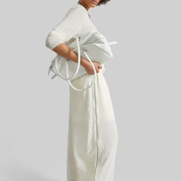The Frankie Shop Articulated Vented Pants - Milk - Oversized Minimalist Pants in White - Shop at Coveti