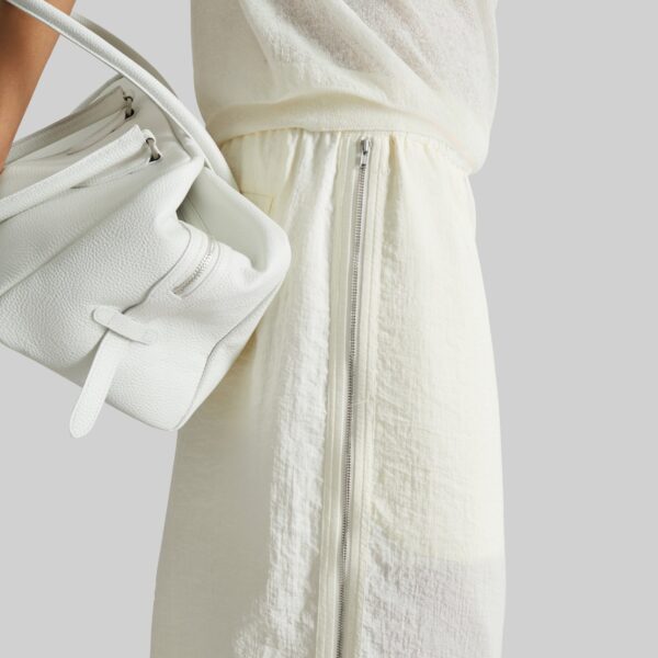 The Frankie Shop Articulated Vented Pants - Milk - Oversized Minimalist Pants in White - Shop at Coveti