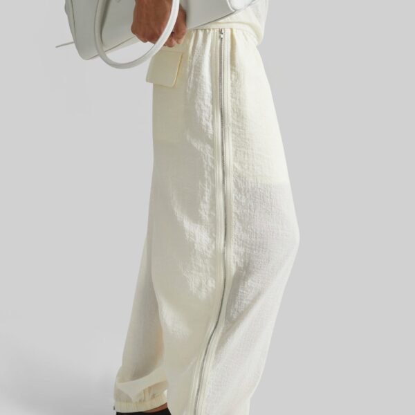 The Frankie Shop Articulated Vented Pants - Milk - Oversized Minimalist Pants in White - Shop at Coveti