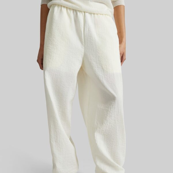 The Frankie Shop Articulated Vented Pants - Milk - Oversized Minimalist Pants in White - Shop at Coveti