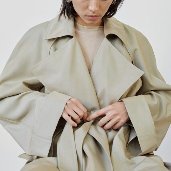 The Frankie Shop Astoria Cut-Out Raglan Sleeve Trench Coat - Beige - Oversized Minimalist Coats in Beige - Shop at Coveti