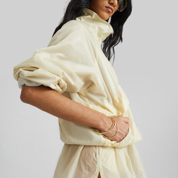 The Frankie Shop Bicos Sheer Mini Track Shorts - Pale Yellow - Oversized Minimalist Shorts in Yellow - Shop at Coveti