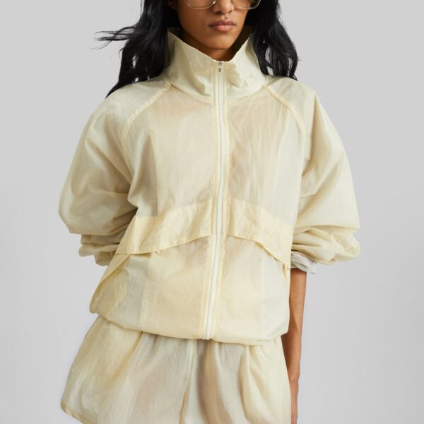 The Frankie Shop Bicos Sheer Track Jacket - Pale Yellow - Oversized Minimalist Jackets in Yellow - Shop at Coveti