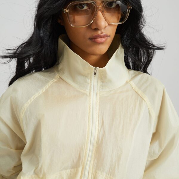 The Frankie Shop Bicos Sheer Track Jacket - Pale Yellow - Oversized Minimalist Jackets in Yellow - Shop at Coveti