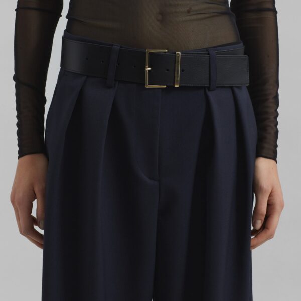 The Frankie Shop Daytona Pleated Trousers - Navy - Oversized Minimalist Pants in Blue - Shop at Coveti