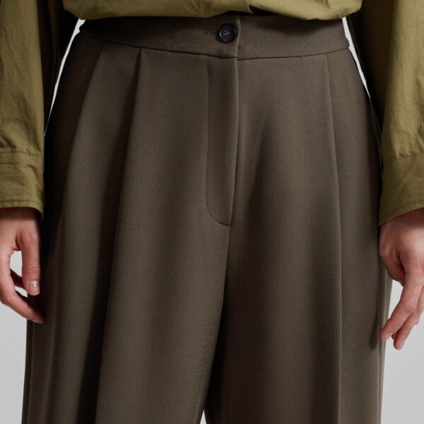 The Frankie Shop Dina Pleated Trousers - Khaki - Oversized Minimalist Pants in Green - Shop at Coveti