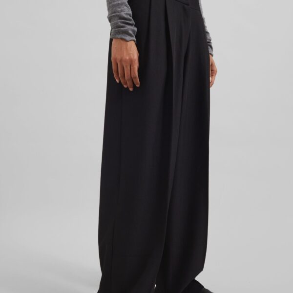 The Frankie Shop Doyer Pleated Trousers - Black - Oversized Minimalist Pants in Black - Shop at Coveti