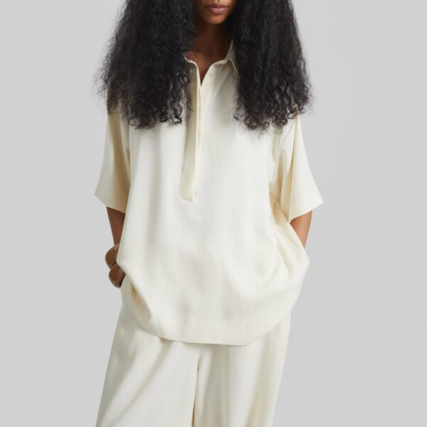 The Frankie Shop Eda Fluid Polo Shirt - Ivory - Oversized Minimalist Tops in Ivory - Shop at Coveti