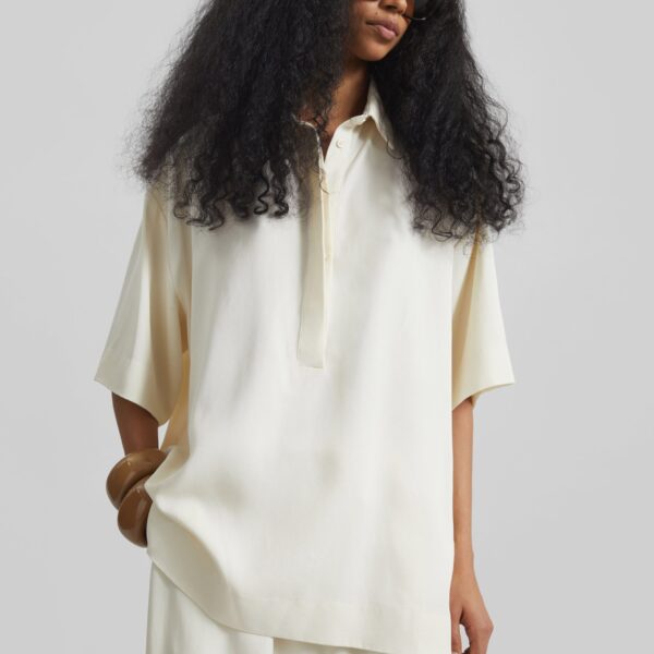 The Frankie Shop Eda Fluid Polo Shirt - Ivory - Oversized Minimalist Tops in Ivory - Shop at Coveti